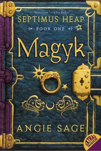 Magyk by Angie Sage book cover. On a background that resembles blue leather, the cover is decorated to resemble a journal with gold metal hinges, corner covers, and a lock that takes a key. In the center of the book is a gold ring.
