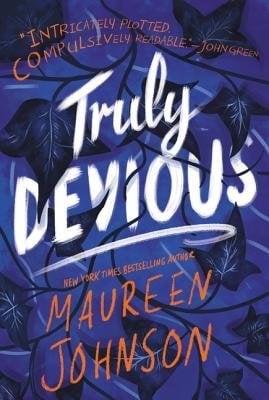 Truly Devious by Maureen Johnson, book cover. A purple background with dark colored vines tangled around the title and cover.