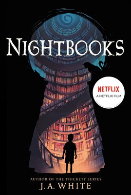 A cover of Nightbooks by J.A. White. There is a boy standing in front of a library seen through a big keyhole.