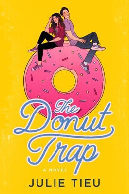 the yellow cover of The Donut Trap by Julie Tieu, with a graphic of a man and a woman sitting on a large pink sprinkled donut