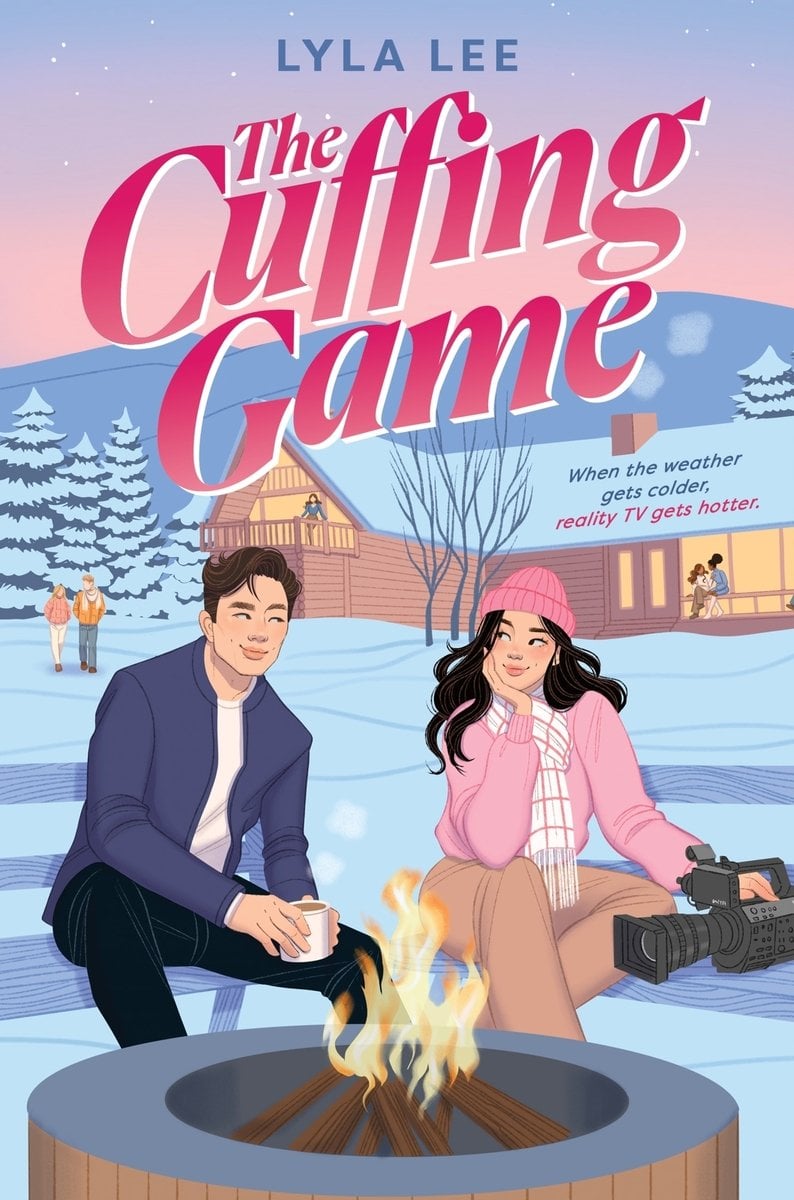 The Cuffing Game by Lyla Lee. A man and woman give each other flirty looks as they sit before a fire in a wintery outdoor cabin scene.