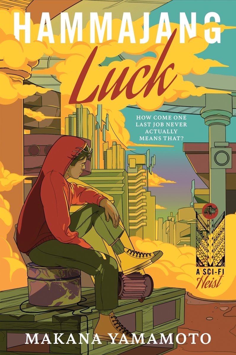 The cover of Hammajang Luck, a sci-fi heist novel, depicts an illustrated cyberpunk city with towering buildings with yellow smoke. A young character in a red hoodie is sitting to the left hand side, looking out at the city.