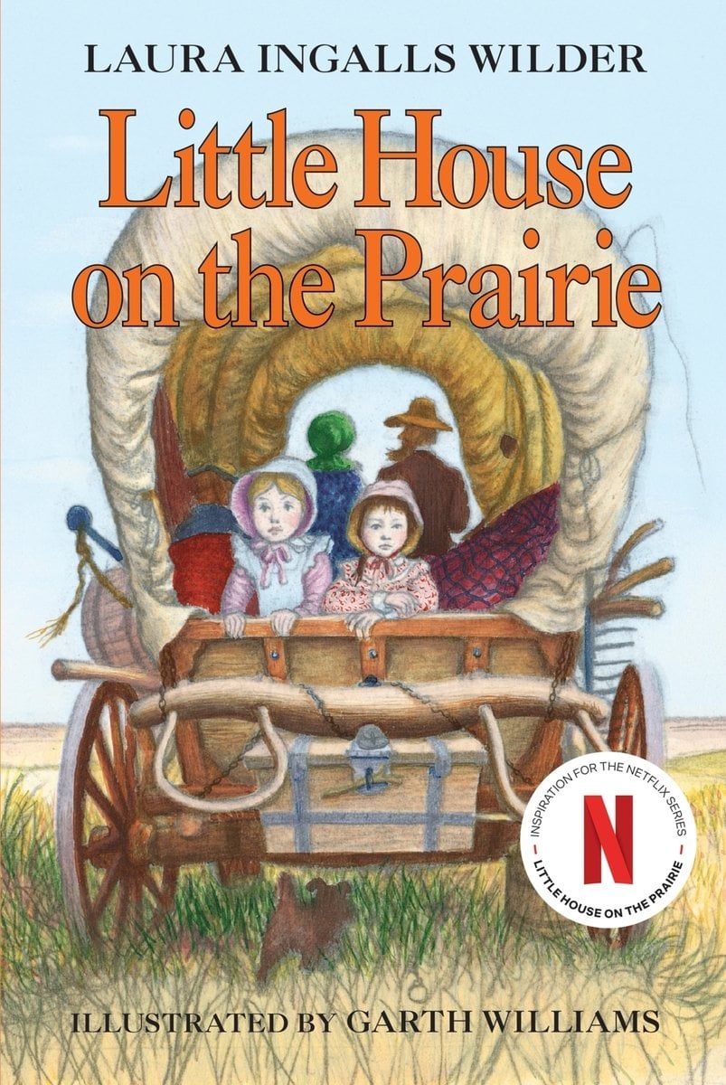 Little House on the Prairie by Laura Ingalls Wilder's book cover depicts an image of a family traveling in a covered wagon across a grassy plane. Two young girls look off into the distance from the back of the wagon.
