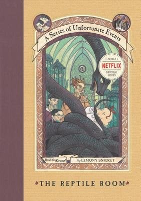 A book cover for "A Series of Unfortunate Events" with a design of a baby or a small boy being eaten by a snake. It says "The Reptile Room" on the bottom.