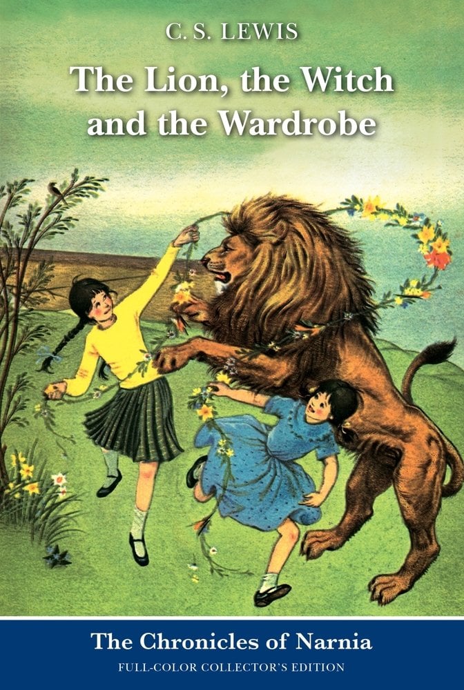 Book cover of The Lion, the Witch and the Wardrobe by C.S. Lewis, featuring two light-skinned children with long, dark hair in braids dance with a flower garland around a rearing male lion in the countryside.