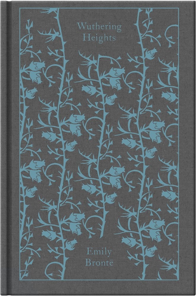 The book cover for Wuthering Heights by Emily Brontë. A dark gray background with blue thorny roses in a repeating pattern.