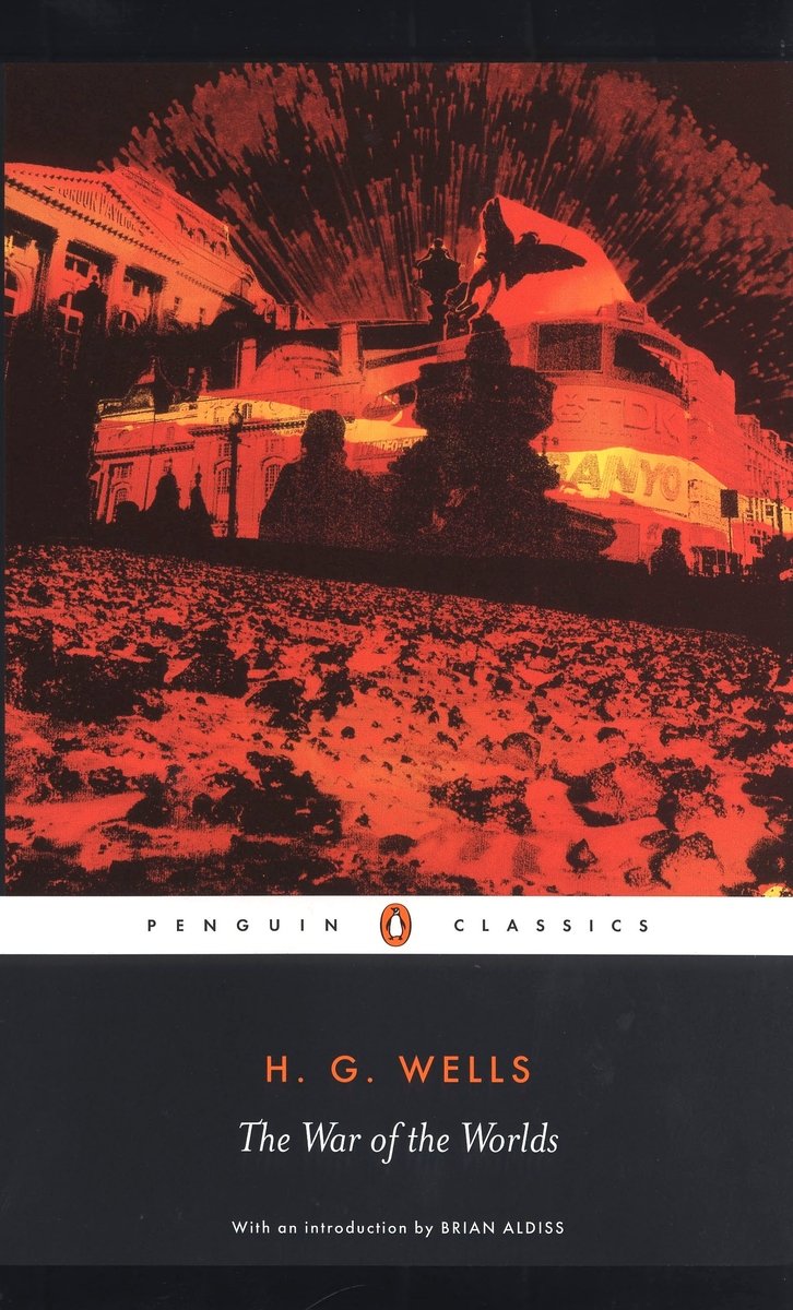 the cover of HG Wells War of the Worlds, with an illustration in red and black of a crater and an explosion wreathed in shadow above the title and author