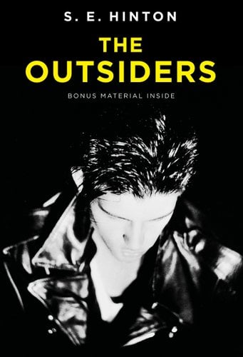 Book cover for The Outsiders with a greaser in a leather jacket looking down in the front.