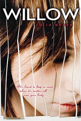 The face of a young girl looking down makes up the cover. White cracked lines travel vertically down the cover. The title sits at the top in large, white letters. The author's name sits under the title in tiny, pink letters.