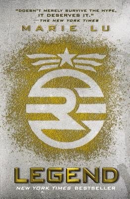 Legend by Marie Lu, book cover. White background with yellow powder in the center, a military symbol outlined in the powder.