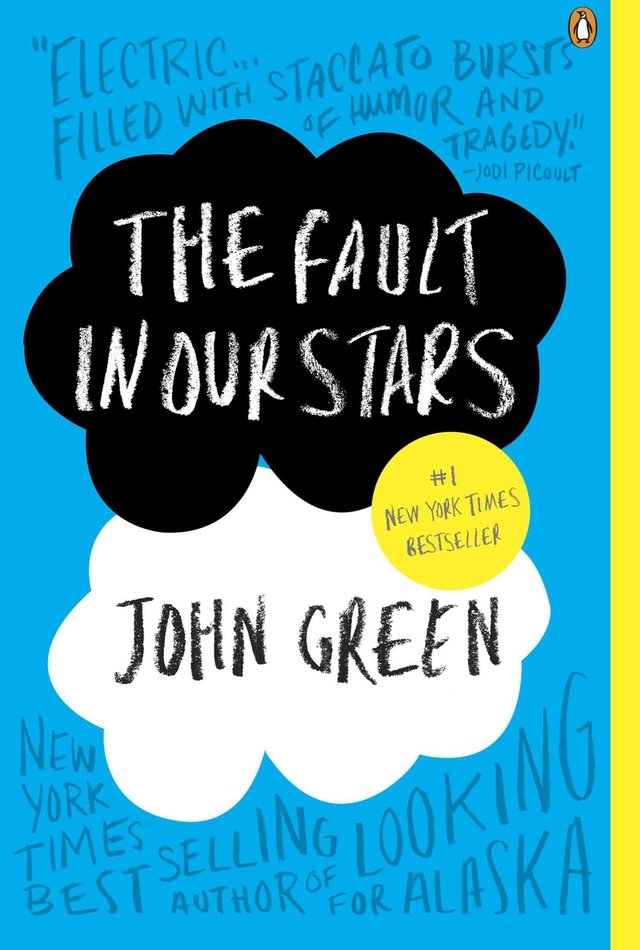 The Fault in Our Stars by John Green book cover. The title is written in chalky writing on a black cloud and the author name is written in black chalk on a white cloud. Both clouds are on a blue background.