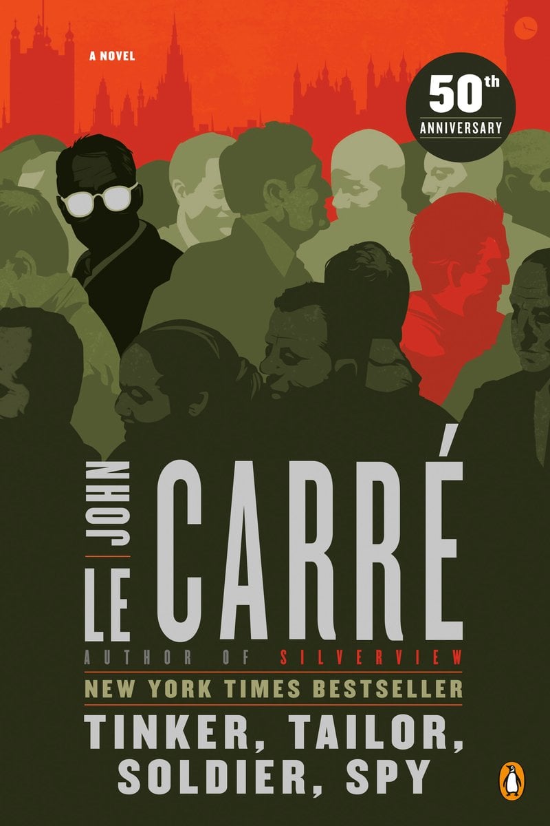 the cover of Tinker, Tailor, Soldier, Spy by John le Carré, with graphics of people in a crowd on a red background with a faint London skyline, with one man in glasses staring at the audience