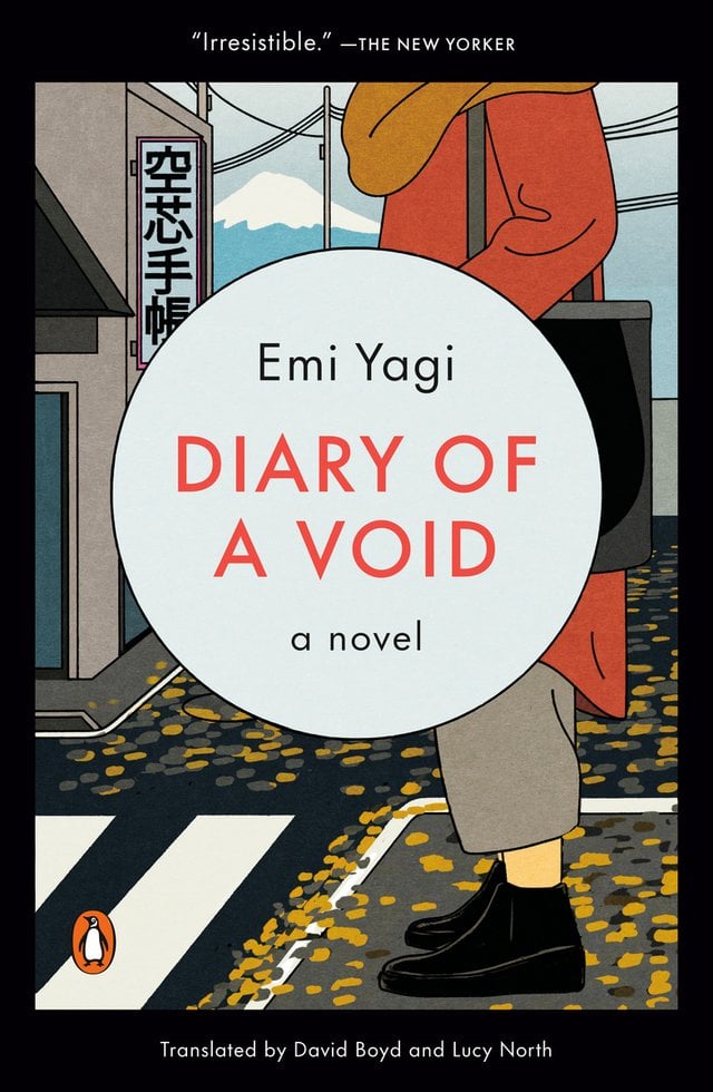 Cover of Diary of a Void by Emi Yagi. A person is wearing a red tunic with a yellow scarf, gray pants, and black shoes. They stand at a crosswalk in a road. A building with a sign in Japanese and power lines are in the background.
