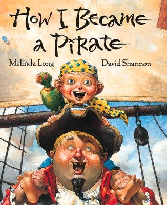 How I Became a Pirate by Melinda Long, a children's book cover depicting a man with a braided black beard, wearing a black pirate hat and a red coat, carrying a child wearing a yellow bandana with a green parrot on his shoulder. The background depicts the beige sails of a boat and cloudy blue sky.