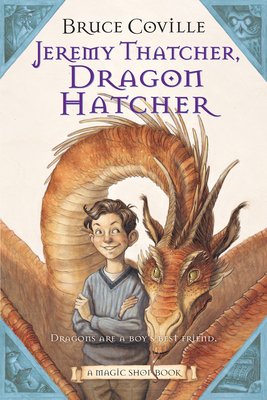 Book cover of "Jeremy Thatcher, Dragon Hatcher" by Bruce Coville, that shows a smiling boy posing with his pet dragon.