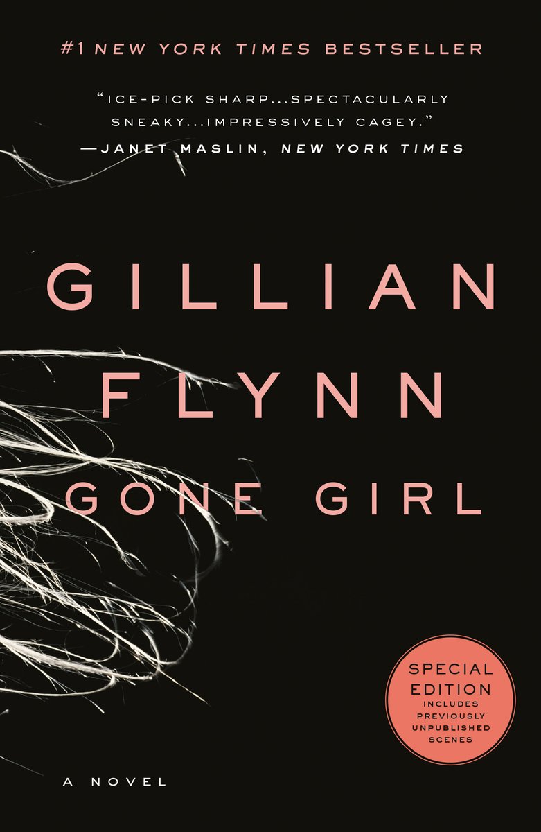 Cover of Gone Girl by Gillian Flynn. There is a black background with white pieces of grass or hay coming out of the side.