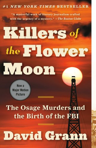 Killers of the Flower Moon book cover showing a sunset skyline with a lookout tower in the foreground