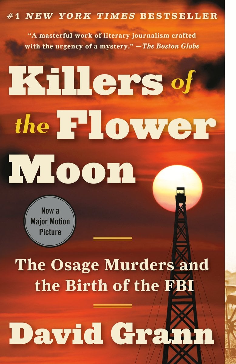 Killers of the Flower Moon, a historical nonfiction book by David Grann. The cover is an illustration of a red sky with a bright moon and oil tower.