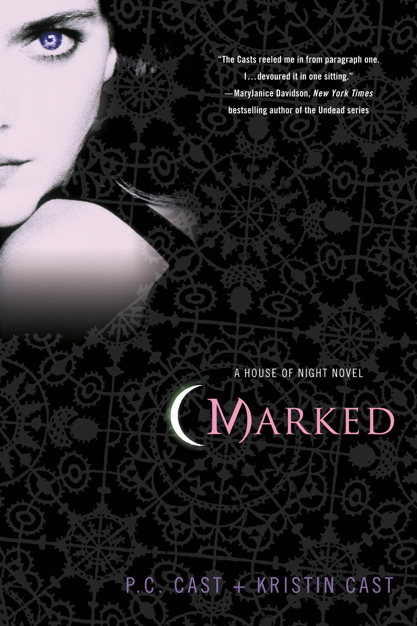 Marked by P.C. Cast and Kristin Cast, a House of Night novel book cover featuring half of a pale face with one striking eye against a black background with ornate patterns. The title appears in pink lettering preceded by a white crescent moon symbol, with a praise quote from bestselling author Mary Janice Davidson at the top.