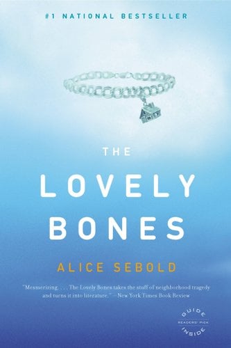 The Lovely Bones book cover; an all blue cover with a charm bracelet with a single house charm dangling off it