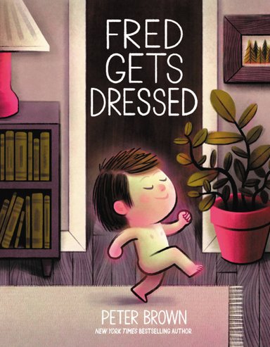 Book cover of Fred Gets Dressed by Peter Brown, featuring a light-skinned, dark-haired child proudly marching nude across a living area of a home.
