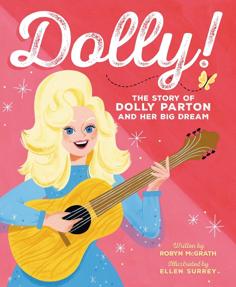 Book cover of "Dolly!: The Story of Dolly Parton and Her Big Dream," written by Robyn McGrath and illustrated by Ellen Surrey, featuring a light-skinned blonde woman in a sparkly blue gown playing an acoustic guitar against a pink background.