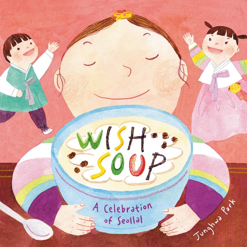 Book cover of Wish Soup: A Celebration of Seollal by Junghwa Park, featuring a smiling light-skinned child with brown hair smelling a bowl of soup with her eyes closed; in the background two more light-skinned children smile brightly as they run around.