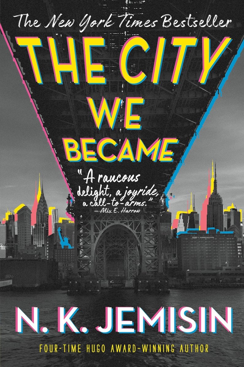 The cover of The City We Became, an urban fantasy novel, depicts the New York skyline from under a bridge. Both are washed out in gray and the boarders are outlined in blue, pink, and yellow.