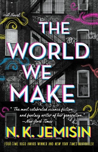 A graffiti-colored apartment building is set as the background. The title and author's name are in the foreground. The title is in large, white lettering across the center. The author's name is in yellow lettering below the title.