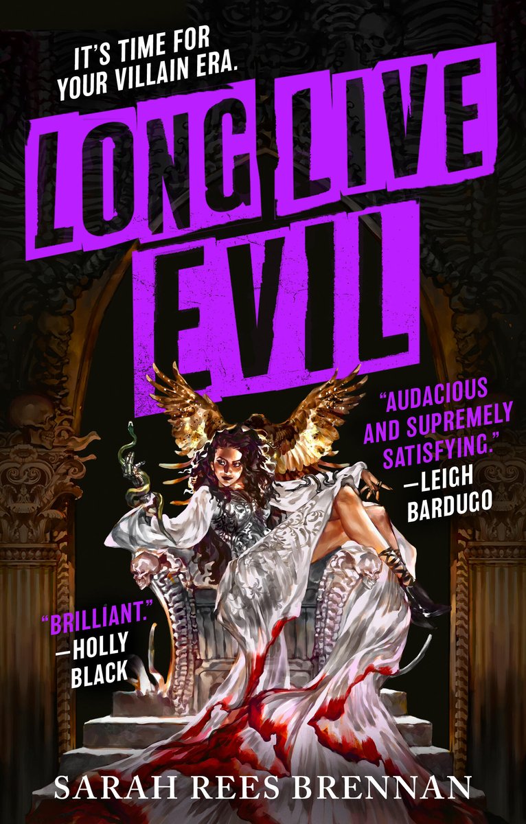 Long Live Evil by Sarah Rees Brennan, book cover. In a dark room with golden pillars on either side, a woman in a white, flowy dress with red stains at the bottom sits on a throne.