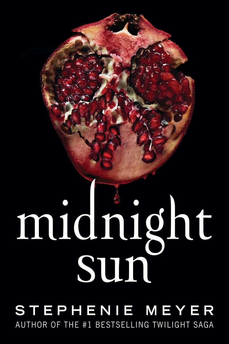 Midnight Sun book cover. The title is in wnhite script over a black background with a pomegranate sliced in half above it.