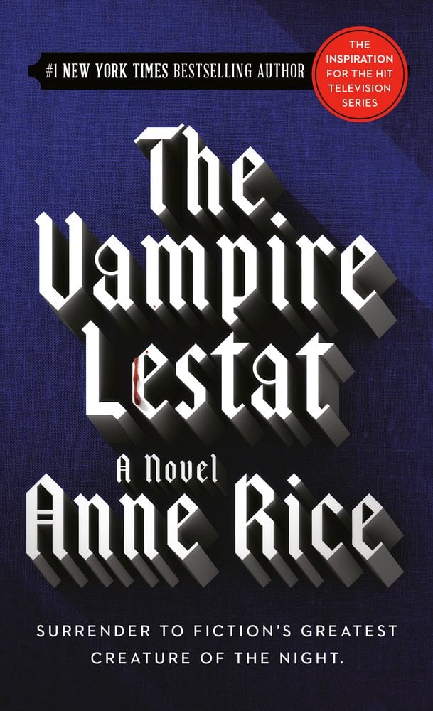 The Vampire Lestat by Anne Rice, a vampire fiction book cover depicting the title and author's name in white block letters on a blue background.