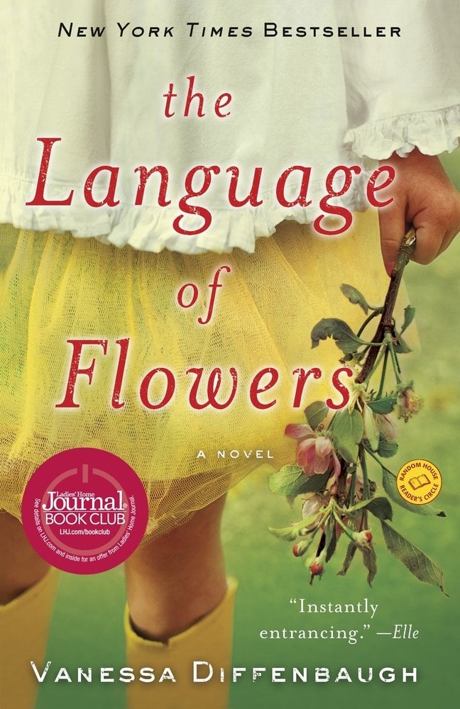 The cover of The Language of Flowers, a contemporary novel, features an close up image of a young girl in a yellow skirt and white top clutching a small batch of flowers in her hand.