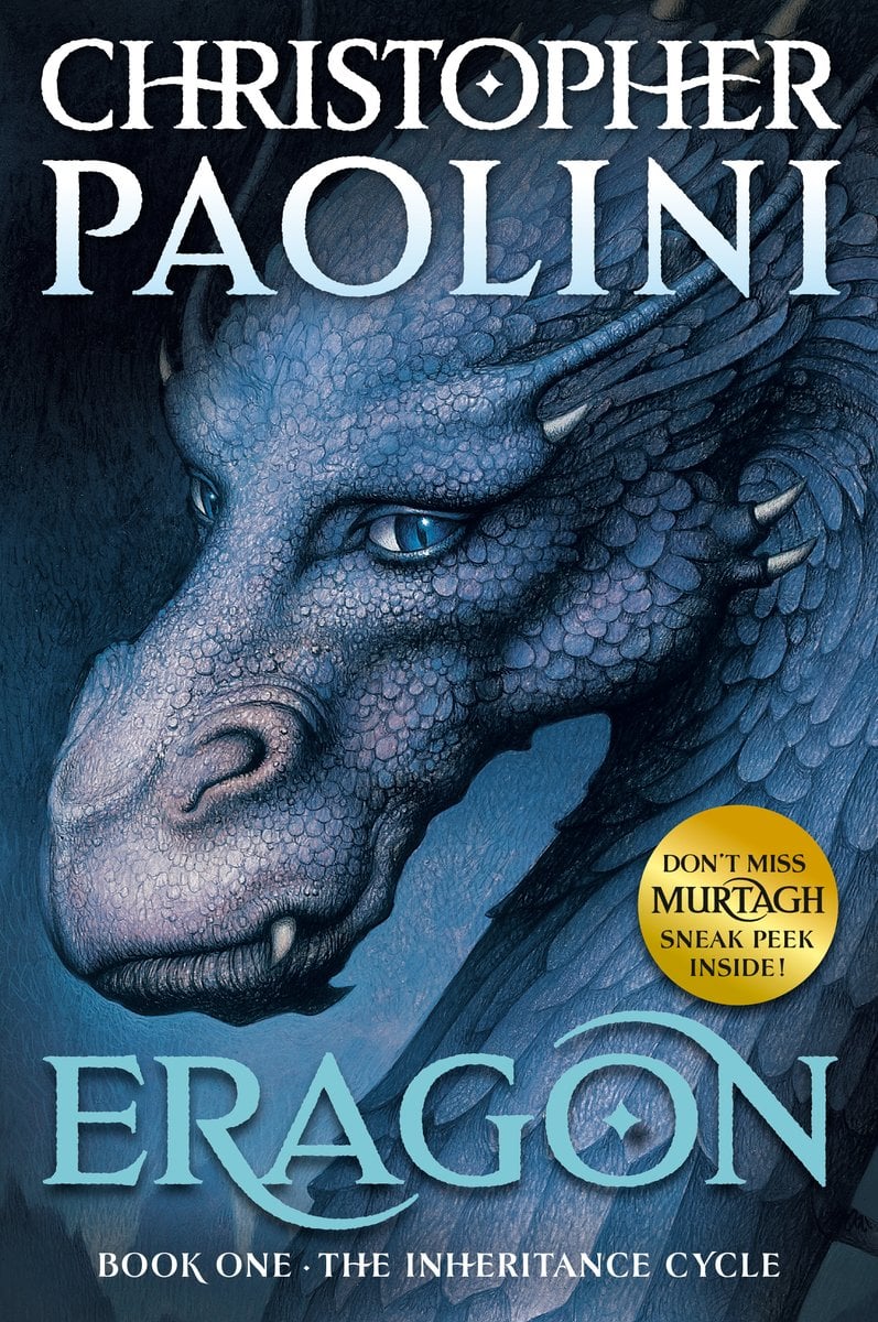 Cover of Eragon by Christopher Paolini. Blue background, with a large blue dragon head, and neck covering the entire cover.