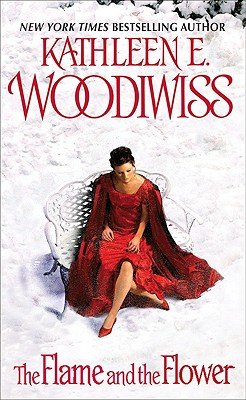 A woman wearing a red dress sits on a white bench in the snow. The author's name is in large, red letters across the top. The title sits at the bottom in smaller red letters.