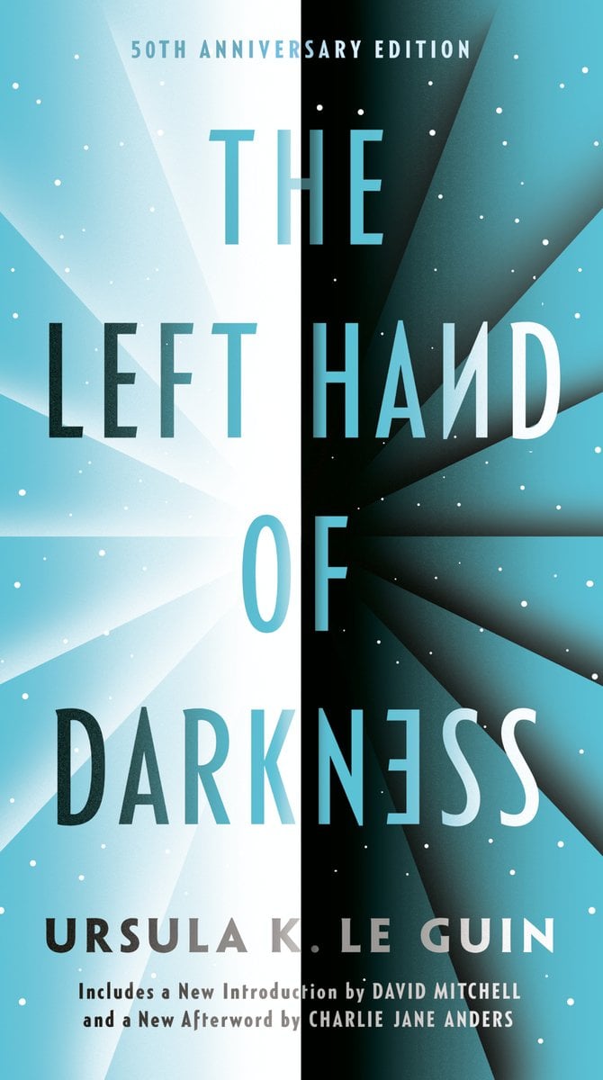 The Left Hand of Darkness by Ursula K. Le Guin conveys a design split in two, the left side pale teal and white, right side deep teal and black. Radiating beams and scattered star dots fill both halves. Large gradient letters spell the title across the center, with the author’s name below and a note that this is the 50th Anniversary Edition.