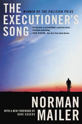 Book jacket of The Executioner's Song by Norman Mailer. A man walks towards the sunset on flat plain, with power lines in the distance.