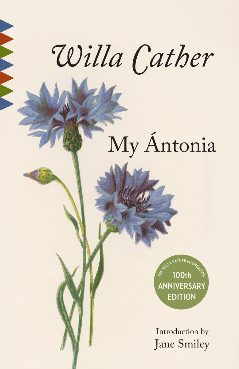 My Ántonia by Willa Cather. Over a cream background, two purple-blue flowers cross over each other beside the title and author text.