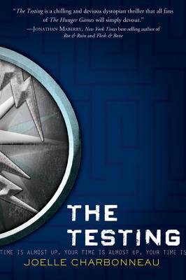 The Testing by Joelle Charbonneau. Blue book cover with a maze and half silver medal.