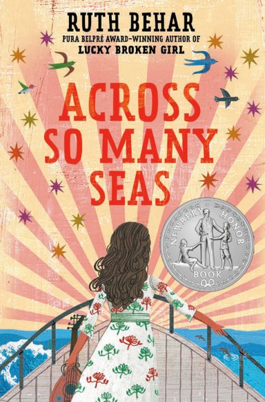 Book cover of Across So Many Seas by Ruth Behar, featuring a tan-skinned child with long wavy brown hair standing at the bow of a ship at sea with a stringed instrument in hand.