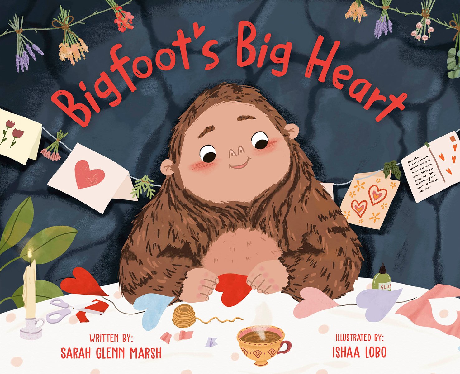 Book cover of Bigfoot's Big Heart by Sarah Glenn Marsh, Illustrated by Ishaa Lobo, featuring a sweet-looking sasquatch-like creature a string of paper hearts on a table with a steaming cup of tea; paper valentines hang on a string behind him.