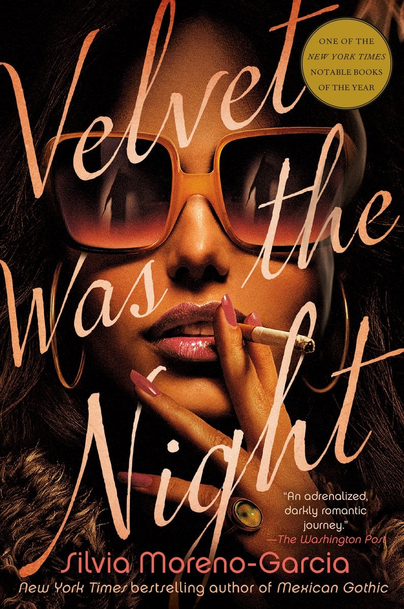 Velvet Was the Night by Silvia Moreno-Garcia, book cover. A woman smoking a cigarette with the shadow of a man reflected in her big, square sunglasses. The title is in cursive and orange, with the author name in a red/pink.