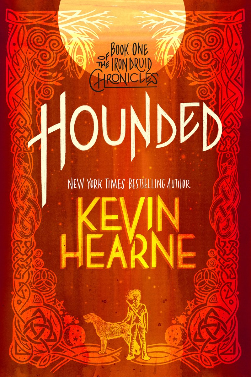 Book cover of the first in 'The Iron Druid Chronicles' called 'Hounded' by Kevin Hearne. The title is in cream colored letters and the author in yellow right below. THe background is red with detailing accents as the border.