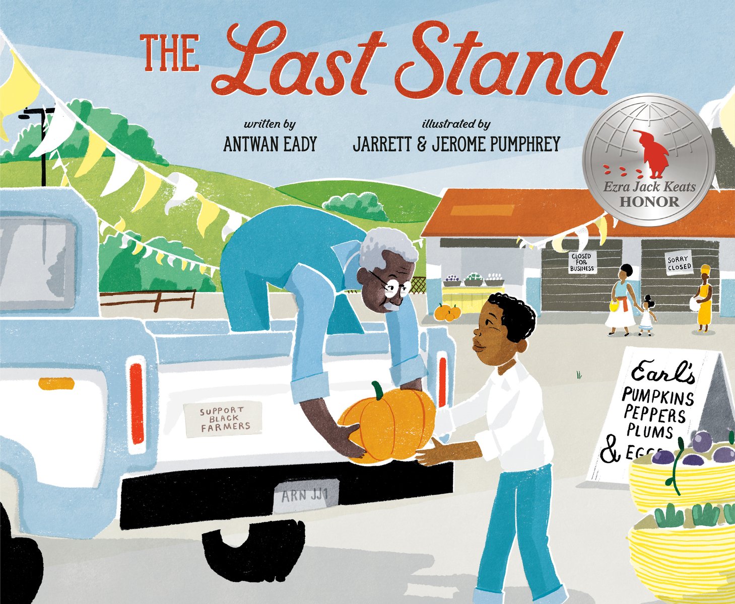 The Last Stand by Antwan Eady book cover features a blue and white pickup truck with an adult handing a large pumpkin to a boy outside of the truck. The background features a building with stands, almost like a market and rolling green, lush hills with a blue sky.