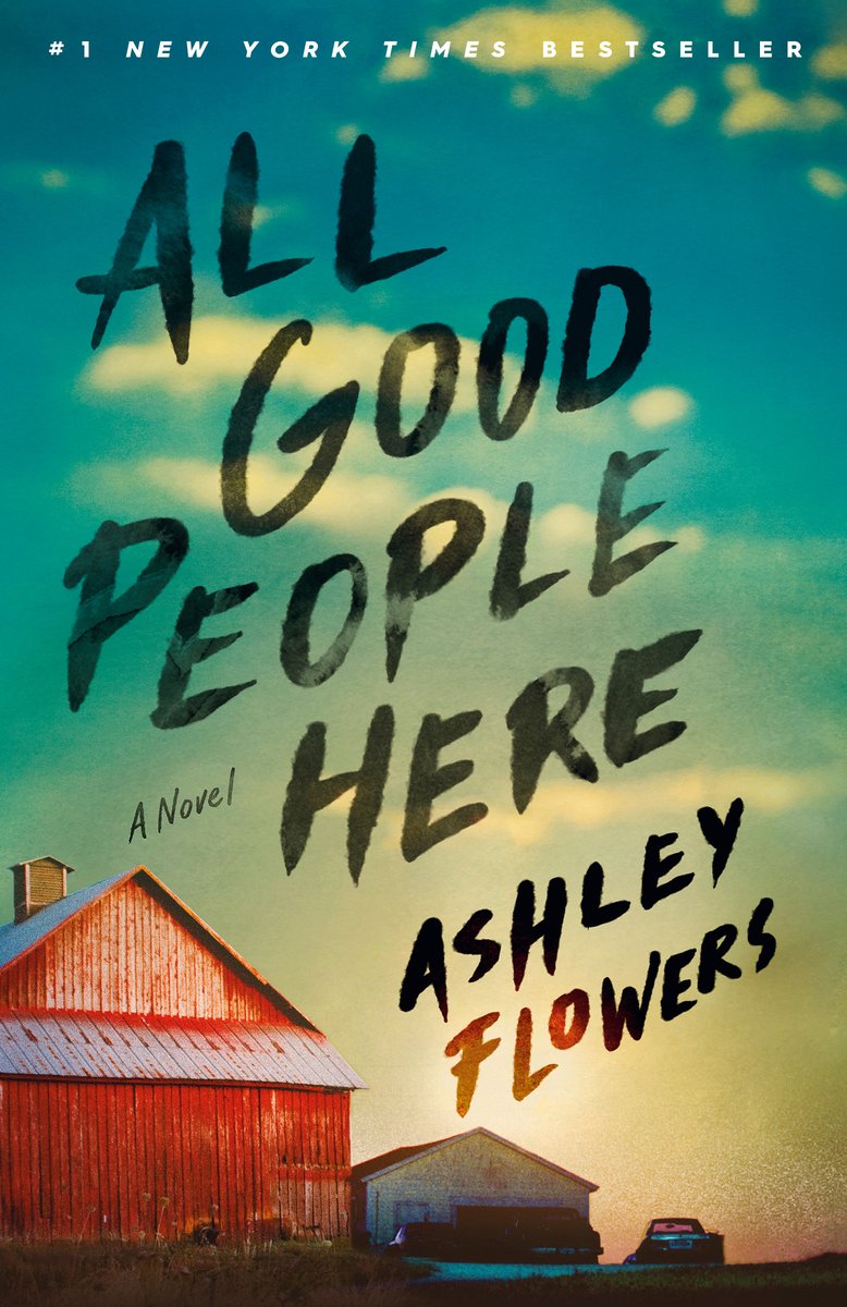 Book cover of 'All Good People Here' by Ashley Flowers, title font is black and diagonal across the background of a sunset sky. In the bottom left corner is a red barn.