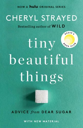 teal book cover of Tiny Beautiful Things with a sugar cube on it.