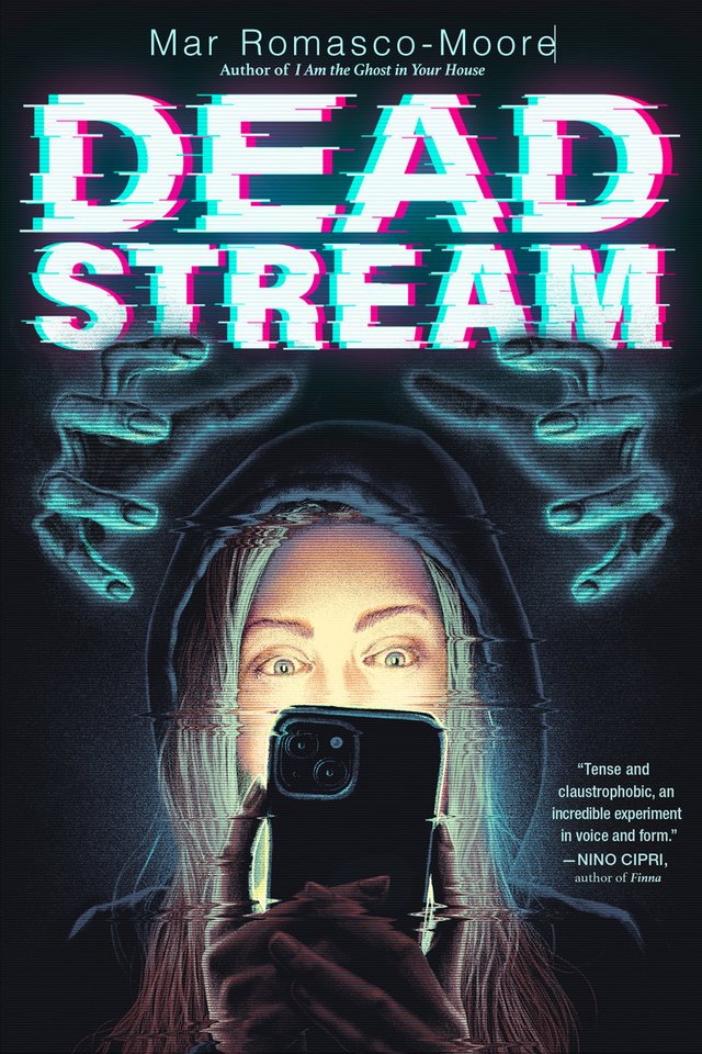 A girl with long blonde hair is wearing a hoodie and looking at her cell phone. The glow of the phone lights up her face. A pair of hands reaches for her head behind her.