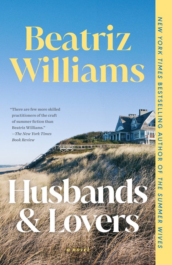 Book cover for Husbands & Lovers by Beatriz Williams depicting a photo image of a beach house in the distance before a beach, and a field of long wheat-like plants. The sky is blue, and there is a pastel yellow strip down the right edge of the cover.