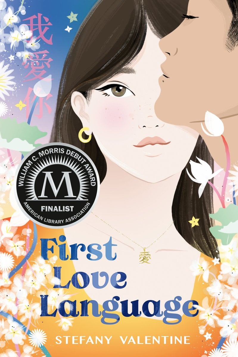 The cover of First Love Language, an AAPI coming-of-age YA novel, features and illustration of a pale Asian girl with black, long hair, gray eyes, and an orange top looking at an illustrated boy to the top left of the cover. The left and right side of the cover have white flowers.