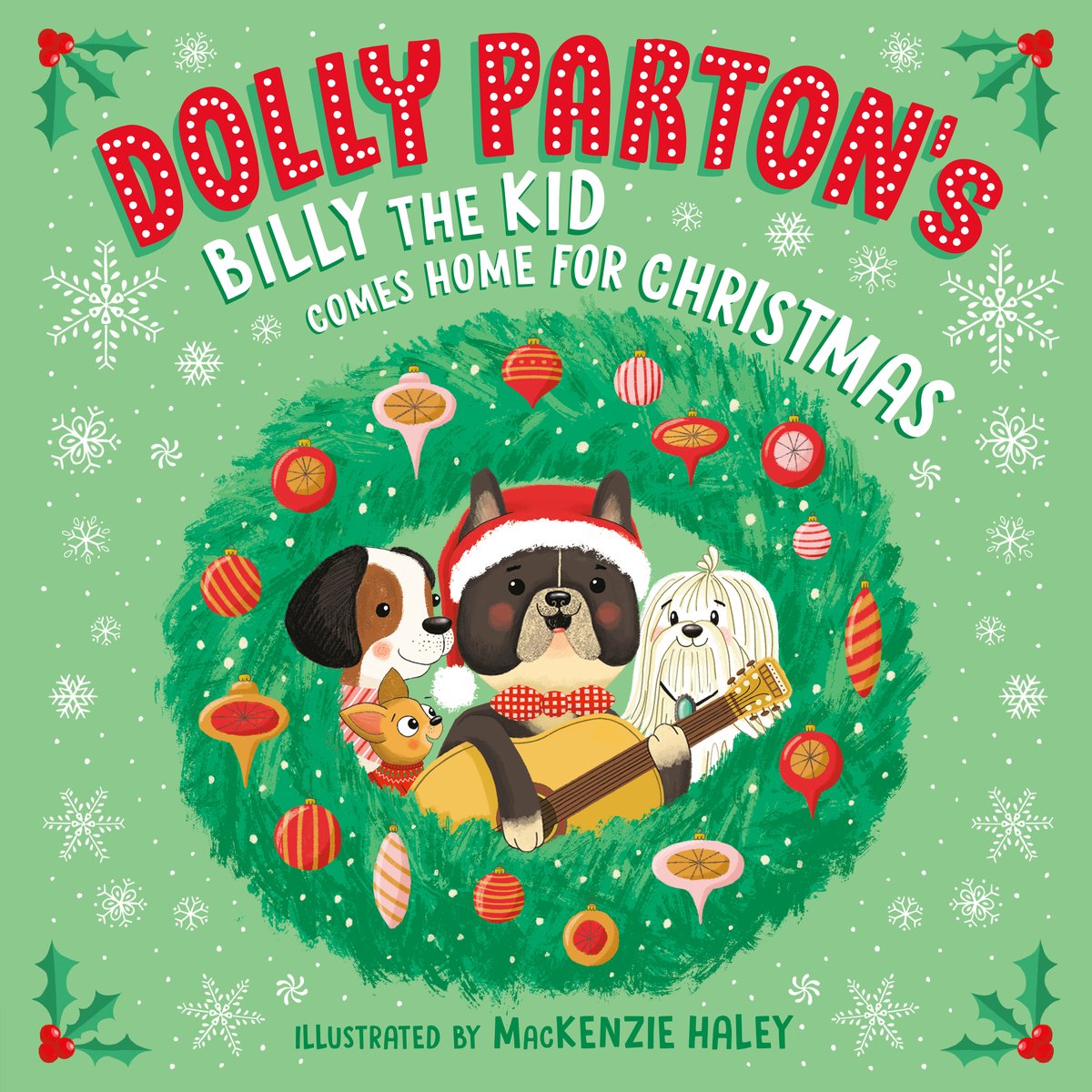Book cover of "Dolly Parton's Billy the Kid Comes Home for Christmas," written by Dolly Parton and illustrated by MacKenzie Haley, featuring a singing black and white French Bulldog in a Santa hat playing an acoustic guitar. Three other smiling dogs - a beagle, a chihuahua, and a lhasa apso - surround him within a green, decorated wreath against a green, snowflake-filled background.